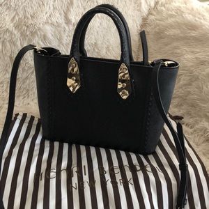 New Henri Bendel elegant black bag.